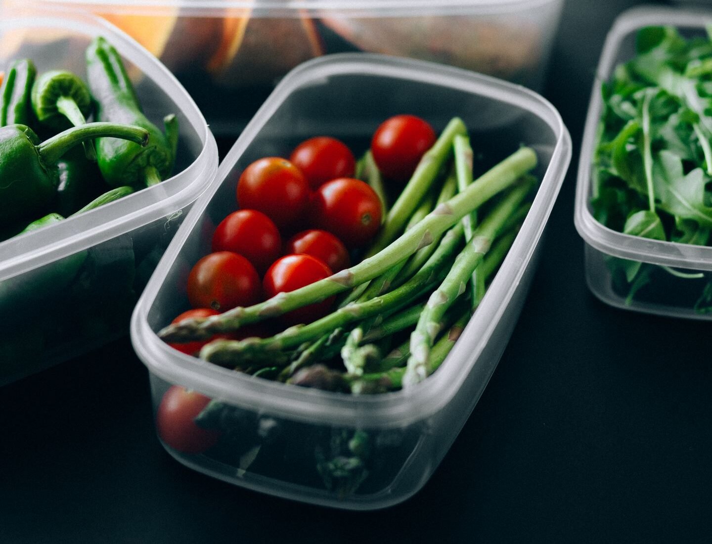 Fresh vegetables sorted into meal preparation containers