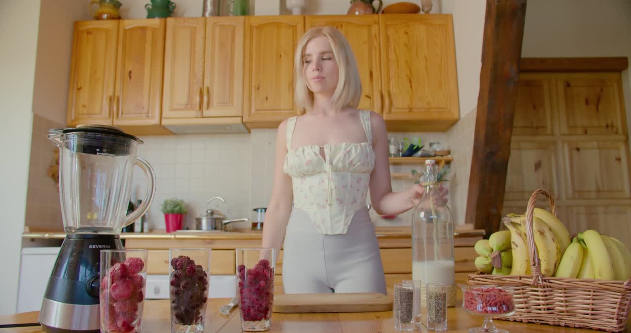 Preparing a fruit smoothie in a home kitchen